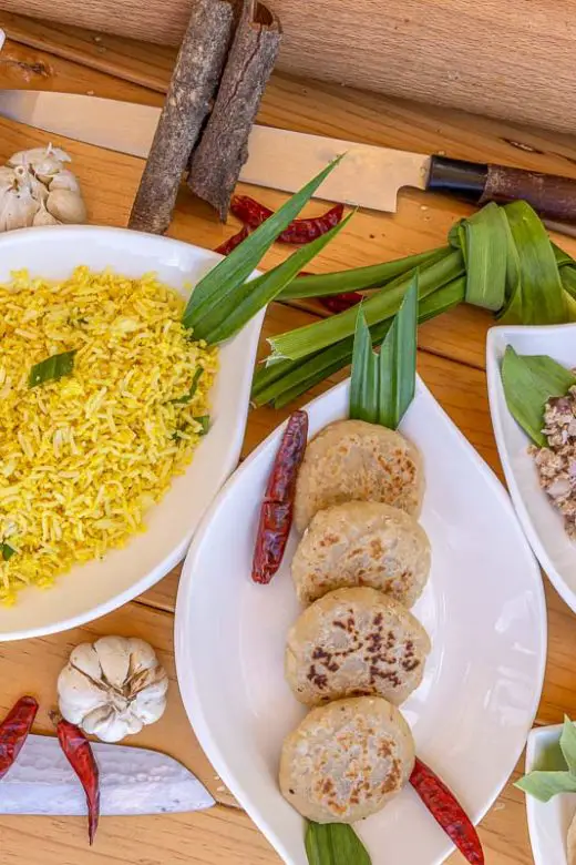 Famous Maldivian cuisine dishes on a wooden table