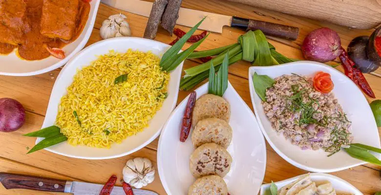 Famous Maldivian cuisine dishes on a wooden table