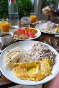 The hearty traditional Maldivian breakfast dish mas huni of shredded smoked tuna, grated coconut, lemon, and onions.