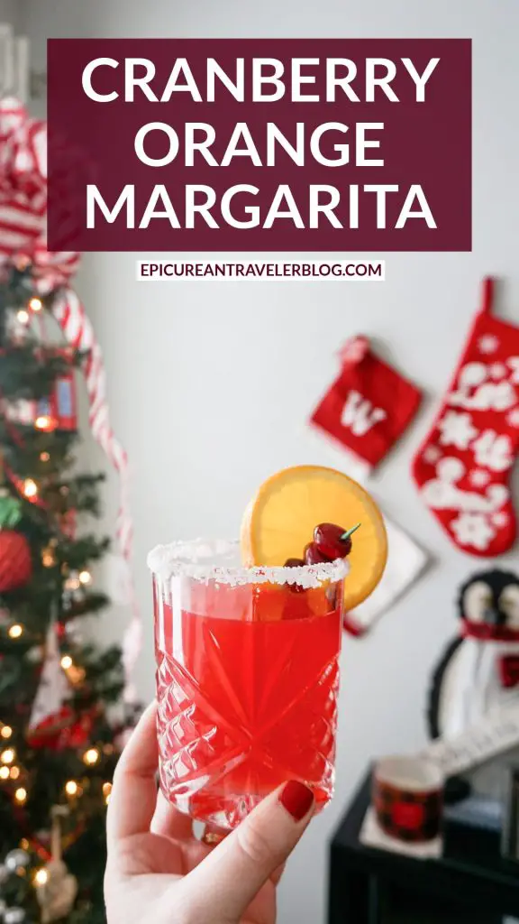 Cranberry orange margarita in a festive Christmas holiday setting