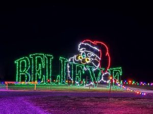 "Believe" Christmas light display featuring Santa's face at Lights of Joy drive-through holiday lights in Shipshewana, Indiana, USA