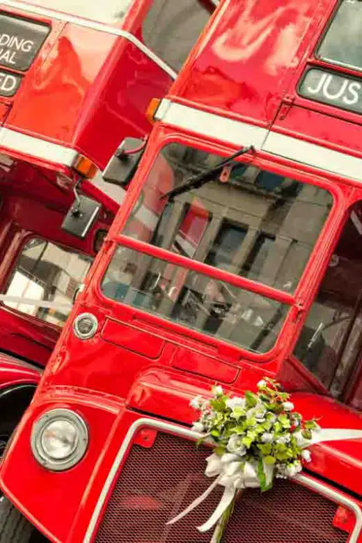Double Decker buses with just married sign in London