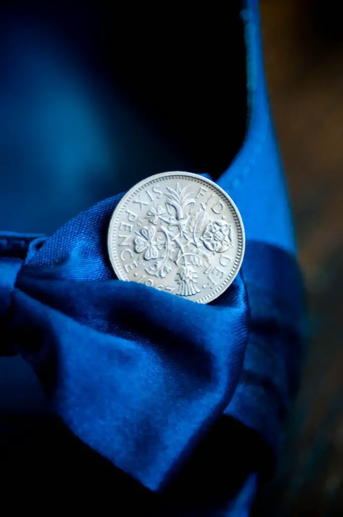 A sixpence coin on a bride's shoe to bring luck on her wedding day in the English tradition of "Something old, something new, something borrowed, something blue, and a sixpence in her shoe"