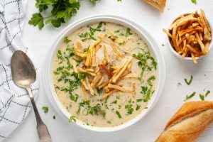 Sopa de mani is an Andean peanut and potato soup from Bolivia in South America