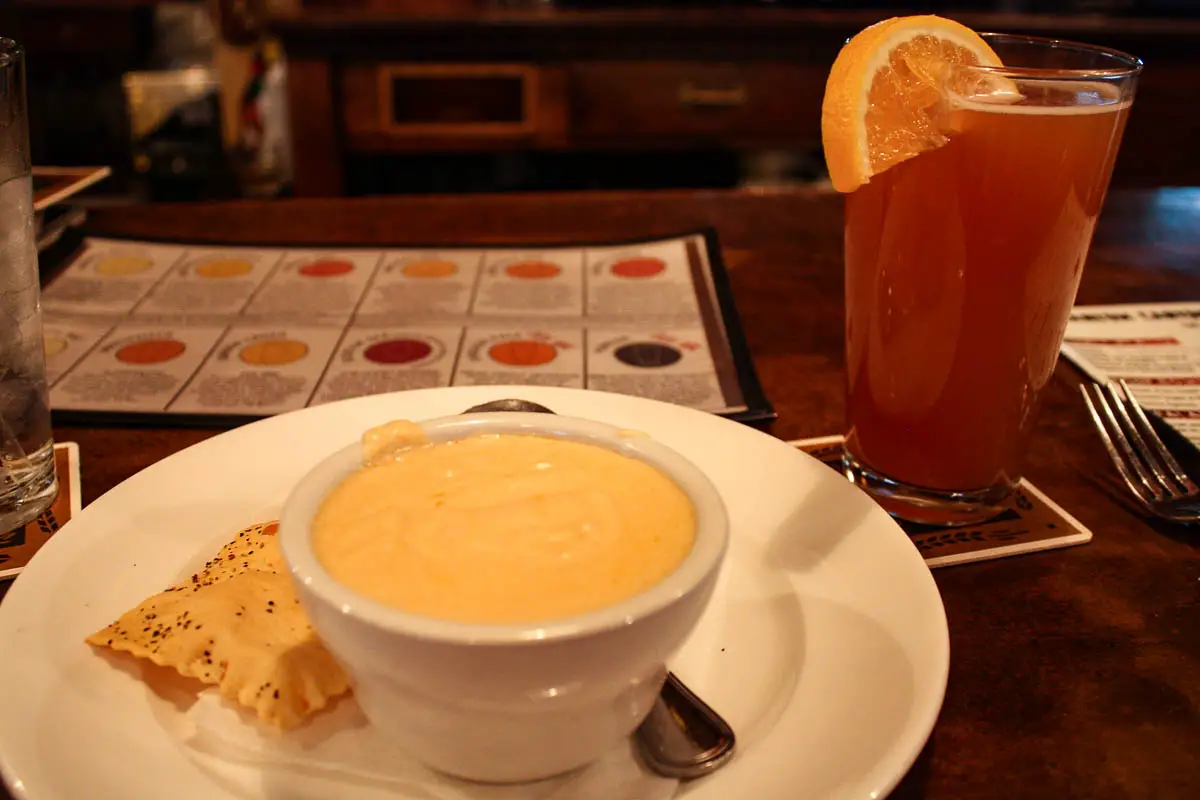 Lager and smoked Gouda soup and a pint of craft beer at Phantom Canyon Brewing Company in Colorado Springs, Colorado, USA