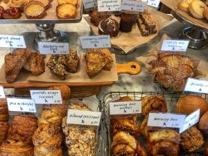 Bakery case filled with pastries at Standard Baking Co. in Portland, Maine, USA