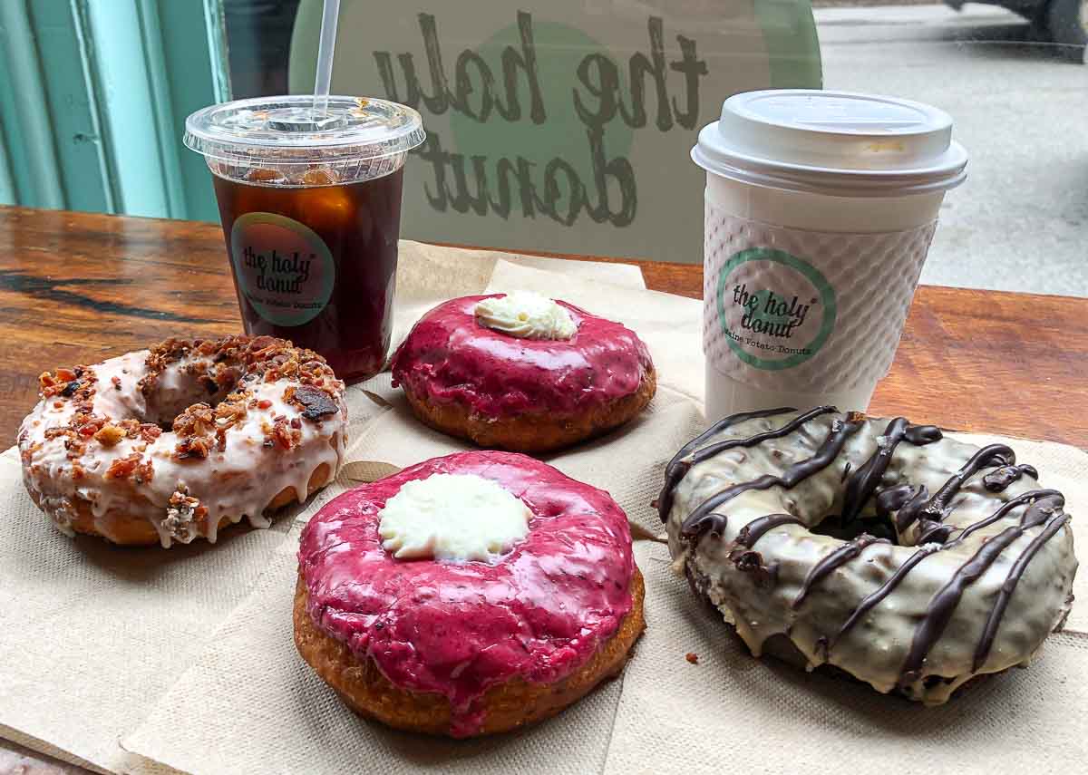Potato donuts and coffee drinks at The Holy Donut in Portland, Maine, USA