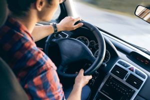 Man driving a car