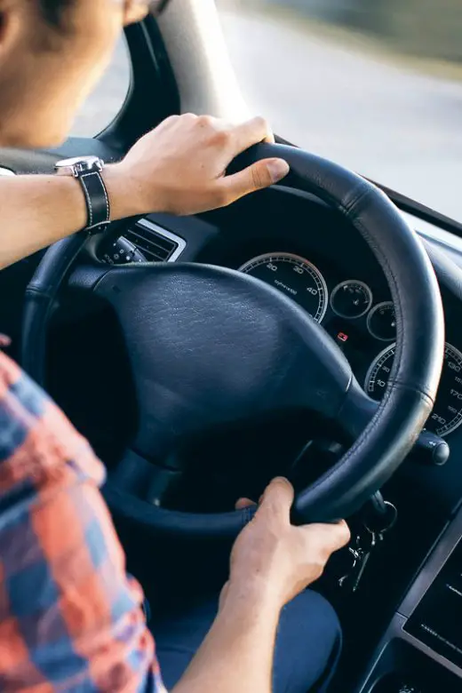 Man driving a car