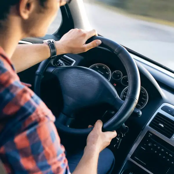 Man driving a car